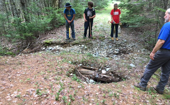 Teen volunteers replaced a rotting wooden culvert with a functional footbridge at Pettengill Preserve.