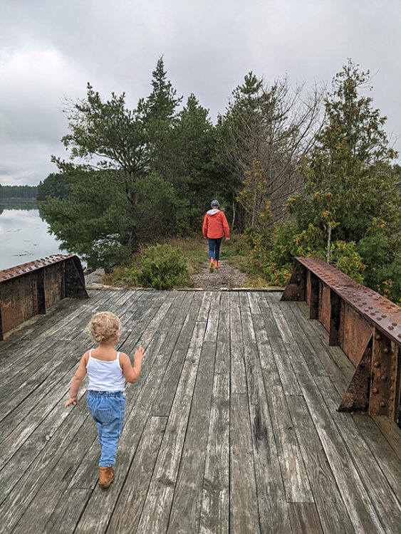 Father and child walking the trestle